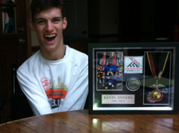 Kevin with award