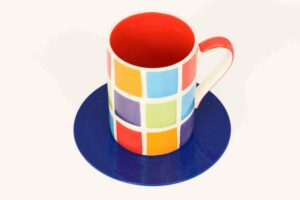anti slip coaster holding mug to help people with reduced hand function have more control over their cups and mugs