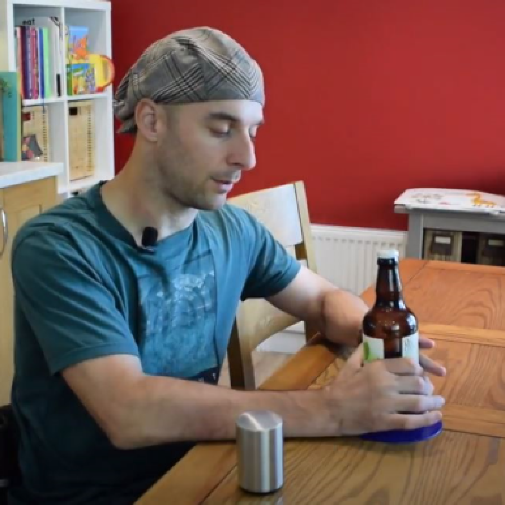 link to video of push-down automatic bottle opener