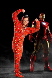 man in an ironman onesie