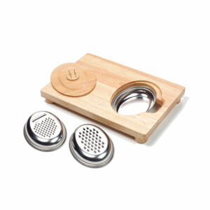 food prep board with bowl in and graters next to it