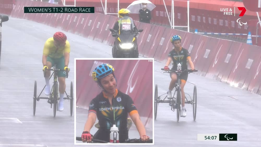 Australian cyclist Stuart Jones spurs on South African cyclist Toni Mould