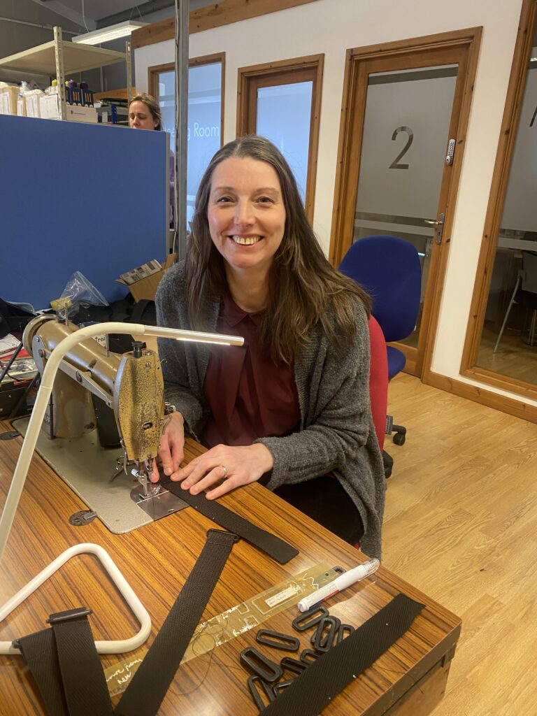 Lucy at the sewing machine